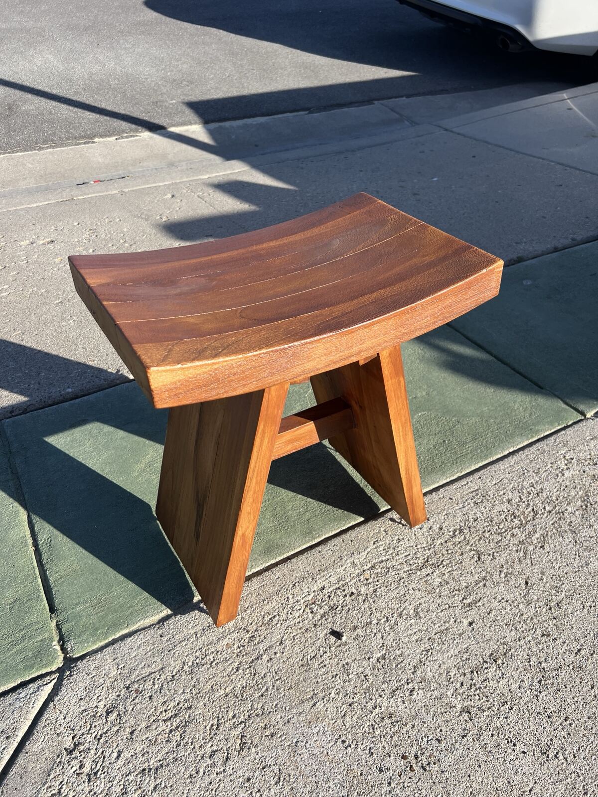Same wooden stool with a warm finish applied